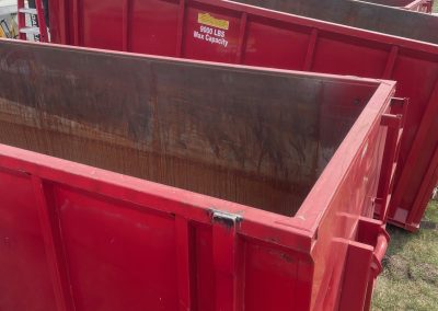 Kavips Sandblasting sandblasted red rolloff bins